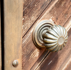 Image showing stripped paint  door    in italy   ancian wood and traditional  