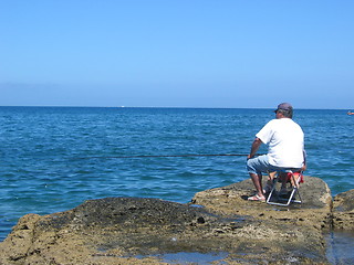 Image showing OLD MAN FISHING