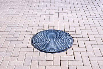 Image showing Pavement of tiles with a hatch