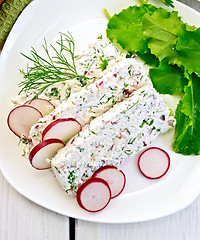 Image showing Terrine of curd and radishes in dish on board top