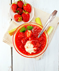 Image showing Dessert strawberry-vanilla and rhubarb in glassful on board top