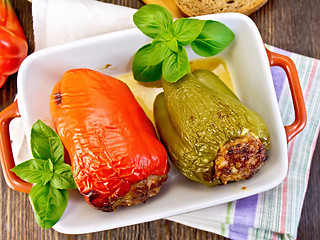 Image showing Pepper stuffed meat in brown roaster top