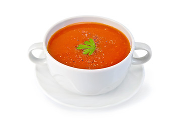 Image showing Soup tomato with parsley in white bowl on saucer