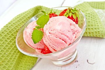 Image showing Ice cream strawberry in glass on board