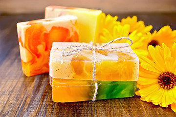 Image showing Soap homemade with calendula on board