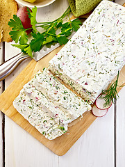 Image showing Terrine of curd and radish on paper and board top