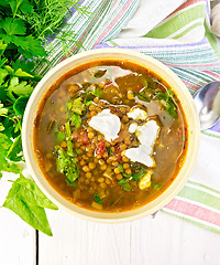 Image showing Soup lentil with spinach on light board top
