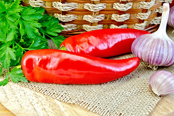 Image showing Pepper red hot and garlic on board