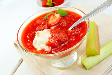 Image showing Dessert strawberry-vanilla and rhubarb in glassful on napkin