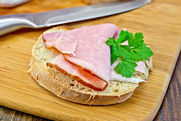 Image showing Sandwich with ham and knife