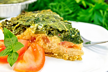 Image showing Pie celtic with spinach in dish on table
