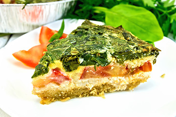 Image showing Pie celtic with spinach in  white plate on table