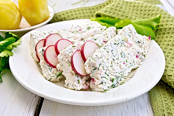 Image showing Terrine of curd and radish in plate on light board