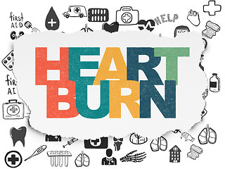 Image showing Health concept: Heartburn on Torn Paper background