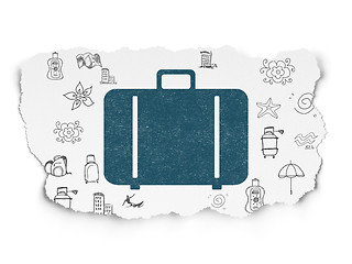 Image showing Travel concept: Bag on Torn Paper background