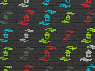 Image showing Insurance concept: House And Palm icons on wall background