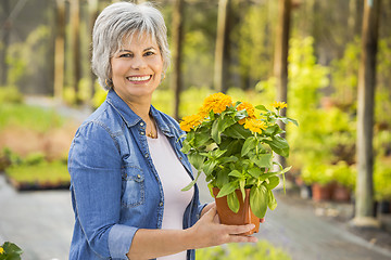 Image showing Working in a flower shop