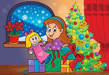 Image showing Girl unpacking Christmas gifts theme 2