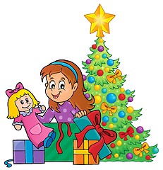 Image showing Girl unpacking Christmas gifts theme 1