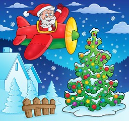 Image showing Christmas theme Santa Claus in plane