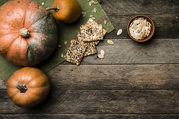 Image showing pumpkins with cookies and seeds in Rustic style  