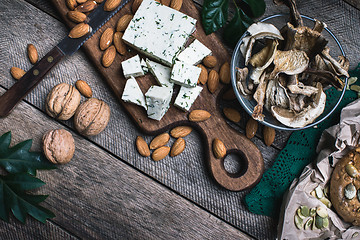 Image showing nuts mushrooms, cheese and bread buns for healthy eating 