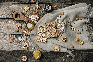 Image showing tasty Cookies with seeds and honey on napkin for diet