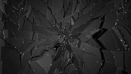 Image showing Splitted or cracked glass on black