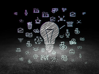 Image showing Finance concept: Light Bulb in grunge dark room