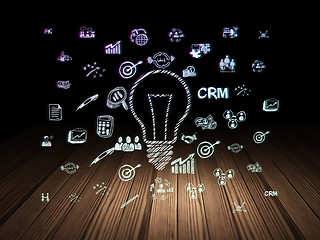 Image showing Business concept: Light Bulb in grunge dark room