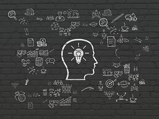 Image showing Business concept: Head With Lightbulb on wall background