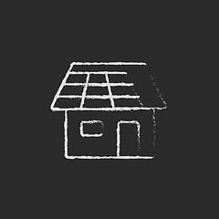 Image showing House with solar panel icon drawn in chalk.