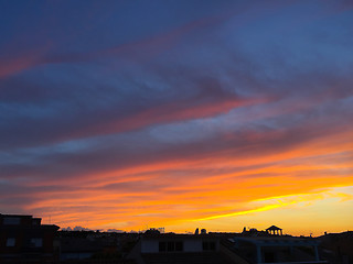 Image showing Sunset with warm clouds