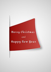 Image showing merry christmas card inserted into paper