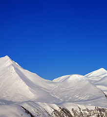 Image showing Snowy mountains and blue clear sky at nice morning