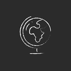 Image showing World globe on stand icon drawn in chalk.