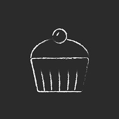 Image showing Cupcake with cherry icon drawn in chalk.