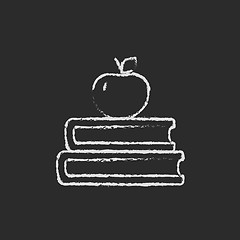 Image showing Books and apple on the top icon drawn in chalk.