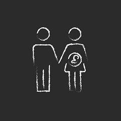 Image showing Husband with pregnant wife icon drawn in chalk.