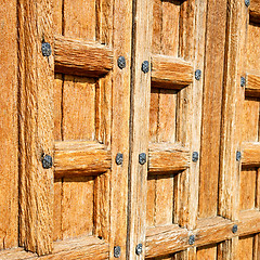 Image showing door    in italy old ancian wood and traditional  texture nail