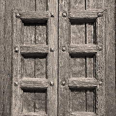 Image showing door    in italy old ancian wood and traditional  texture nail