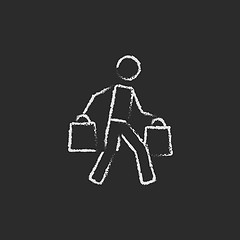 Image showing Man carrying shopping bags icon drawn in chalk.