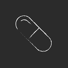 Image showing Capsule pill icon drawn in chalk.