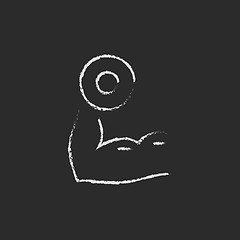 Image showing Arm with dumbbell icon drawn in chalk.