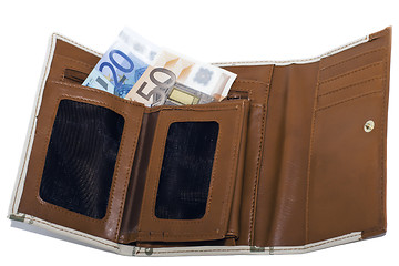 Image showing wallet, bright orange and a little bit of money on the white bac