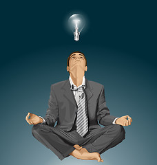 Image showing Vector Businessman in Lotus Pose Meditating