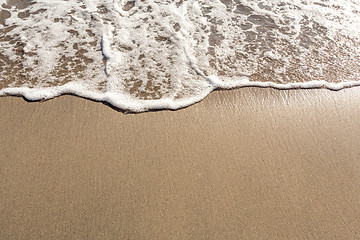 Image showing Tropical beach wave close