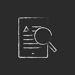 Image showing Tablet and magnifying glass icon drawn in chalk.