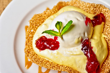 Image showing cake with jam ice cream