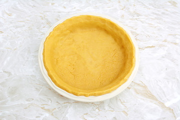 Image showing Circular pie dish lined with pastry